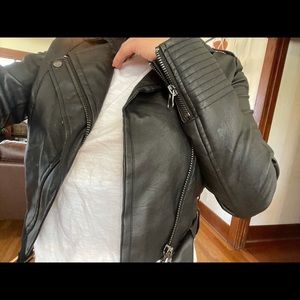 Leather jacket . Runs a little small but I do have a big chest.